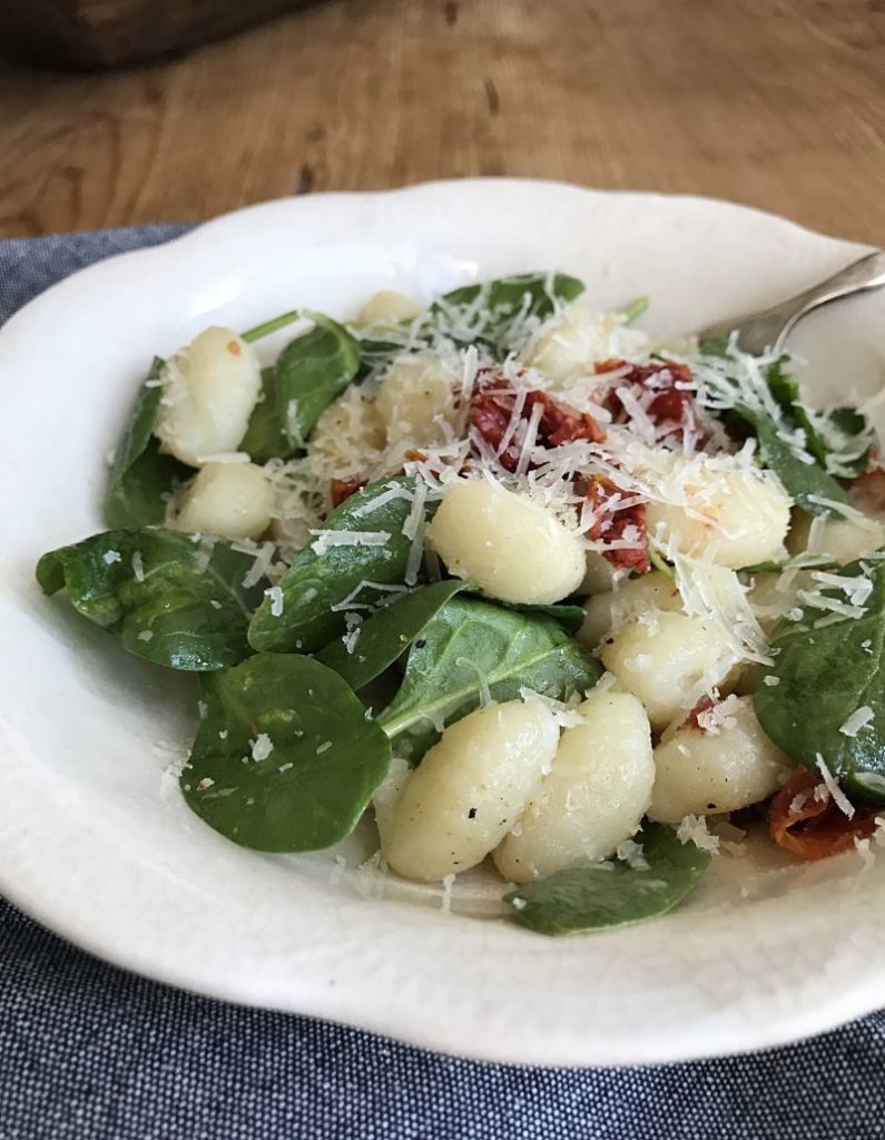 Easy Gnocchi with Sun Dried Tomatoes Spinach and Bacon