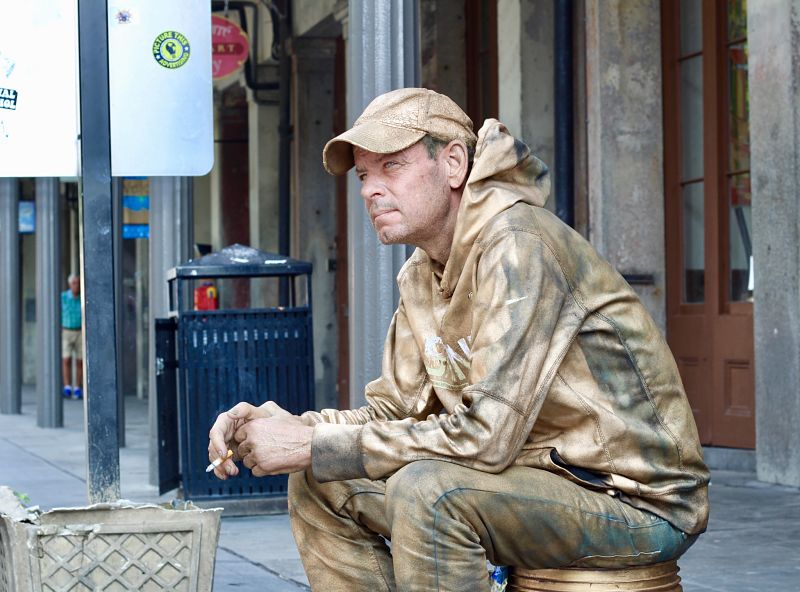 new orleans street performer on break during day