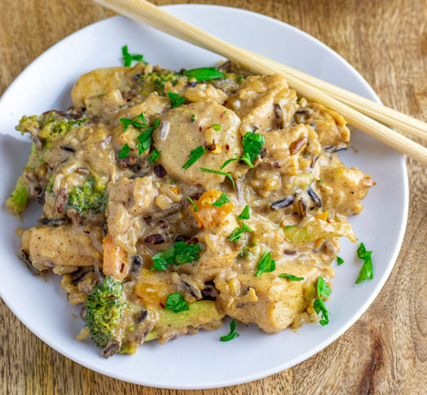 Almond Butter Coconut Curry Chicken on White Plate with Chopsticks